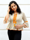 Nysa Bell Sleeves Top, quirky boho bell sleeves top with pom pom detail from our designer collection of tops for women.