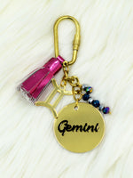 Sun signs Keychain Bagcharm, a unique handcrafted keychain bag charm from our designer collection of hand embroidered keychain and bag charms online.