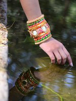 Nargis Gota Bangles (Orange-Green), a unique designer, handcrafted bangle from our latest wedding collection of hand embroidered, kundan, gota, zari and pearl bangles for women.