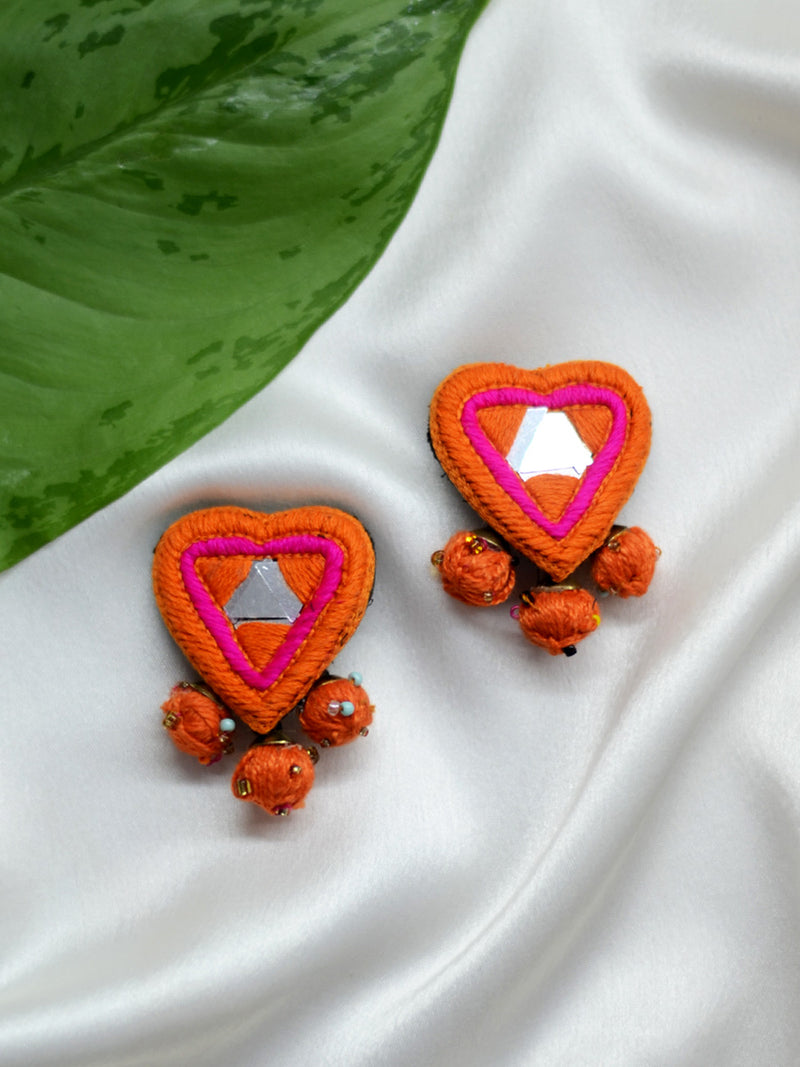 Dil Deewana Earrings, a heart shaped embroidered mirror earring with handcrafted beaded yarn balls from our designer collection of earrings for women online.