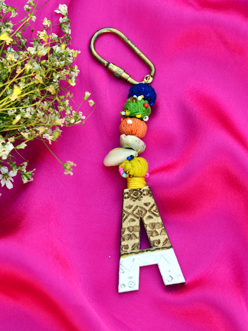 Boho Alphabet Keychain Bagcharm, a unique handcrafted keychain bag charm from our designer collection of hand embroidered keychain and bag charms online.