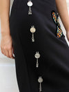 Siya Coin Embellished Pencil Skirt, a hand embroidered designer skirt with mirror detailing from our latest collection of handmade skirts for women. 