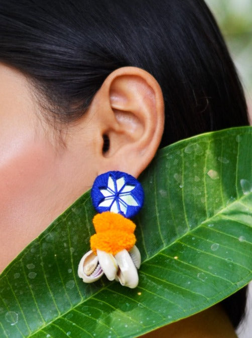 Zoya Pom-pom Shell Earrings, a chic hand embroidered shell earrings with mirror and pom pom detailing from our quirky designer collection of earrings for women online.