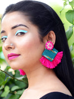 Nida Shine Earrings, a handcrafted unique coin earring with handmade ikat base and mirror and tassel detailing from our bohemian collection of earrings for women.